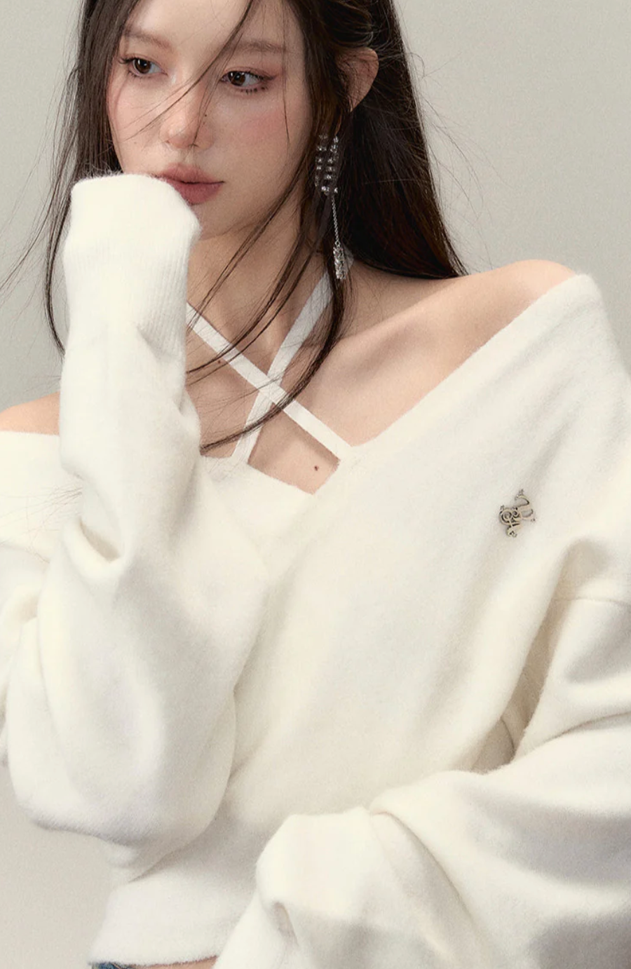 Off-shoulder knitted wool long-sleeve top