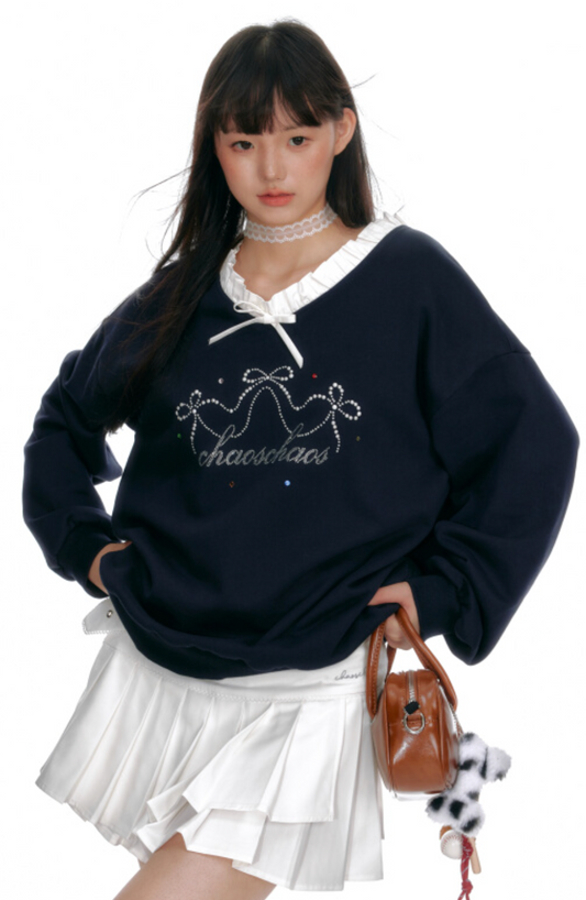 Navy blue ruffled v-neck sweatshirt with necklace