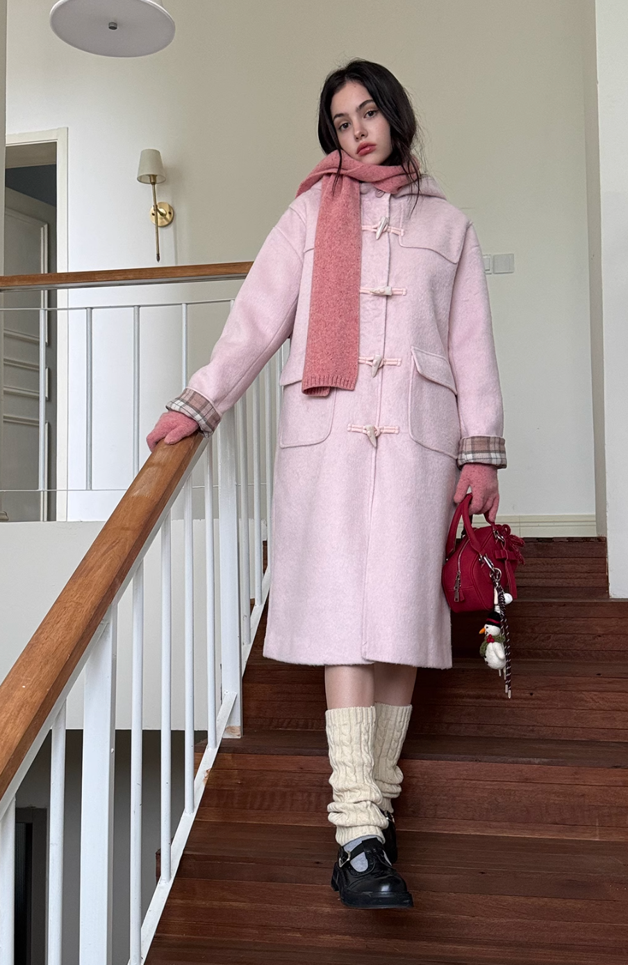 Pink hooded wool coat with checked interior