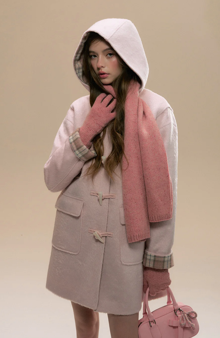 Pink hooded wool coat with checked interior