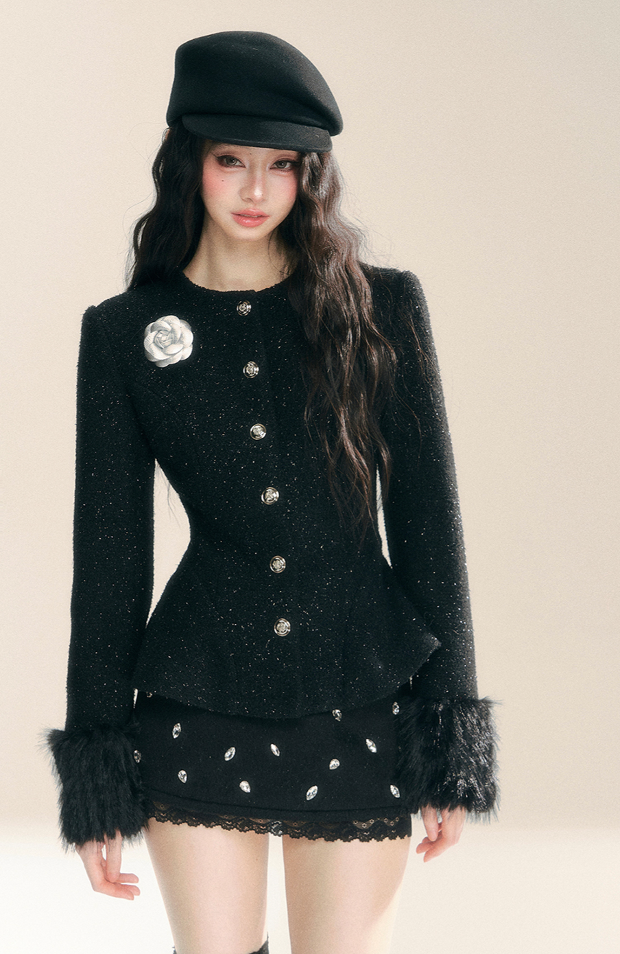 Black cardigan coat with white flower detail