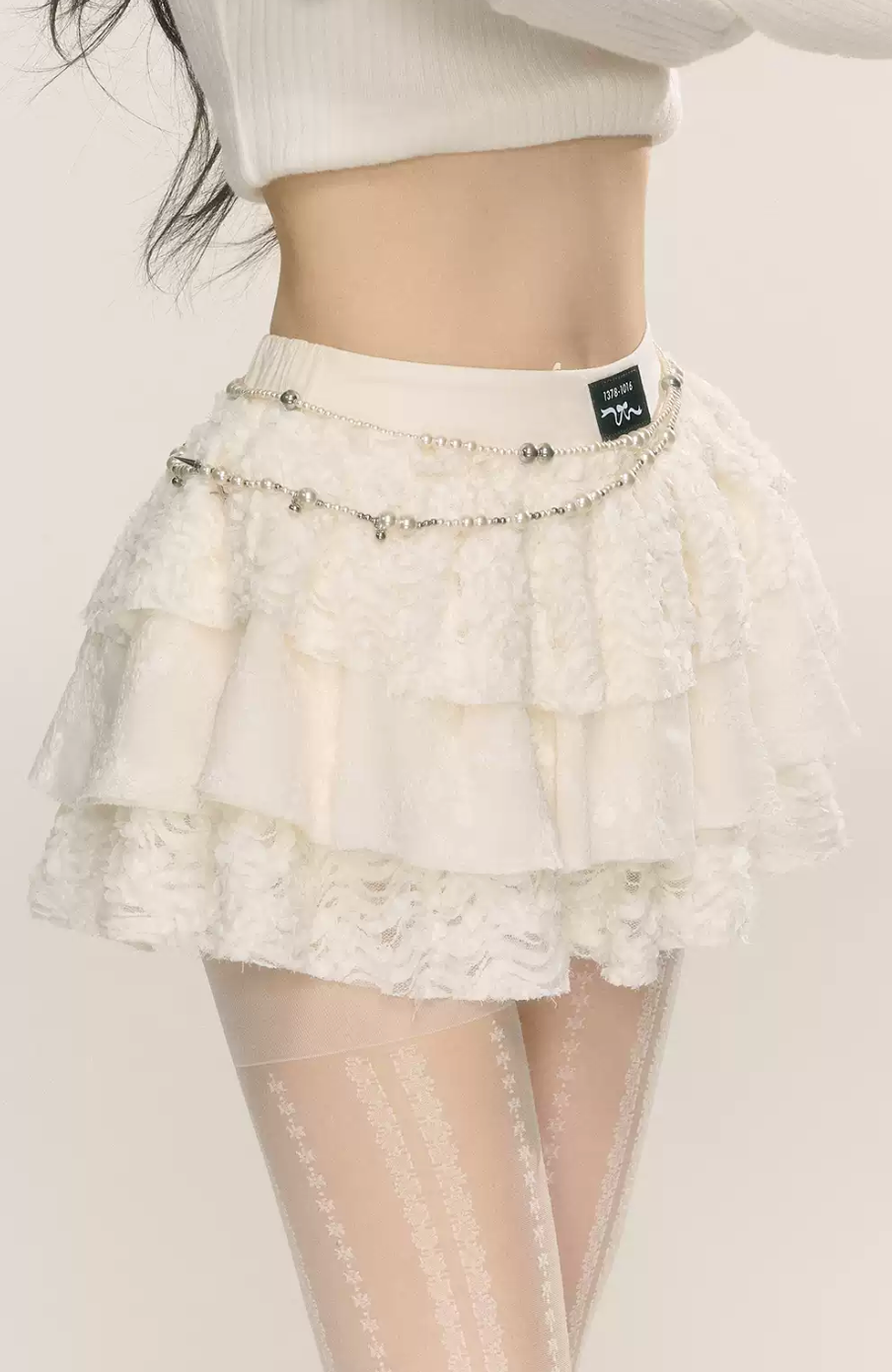 Layered lace mini skirt