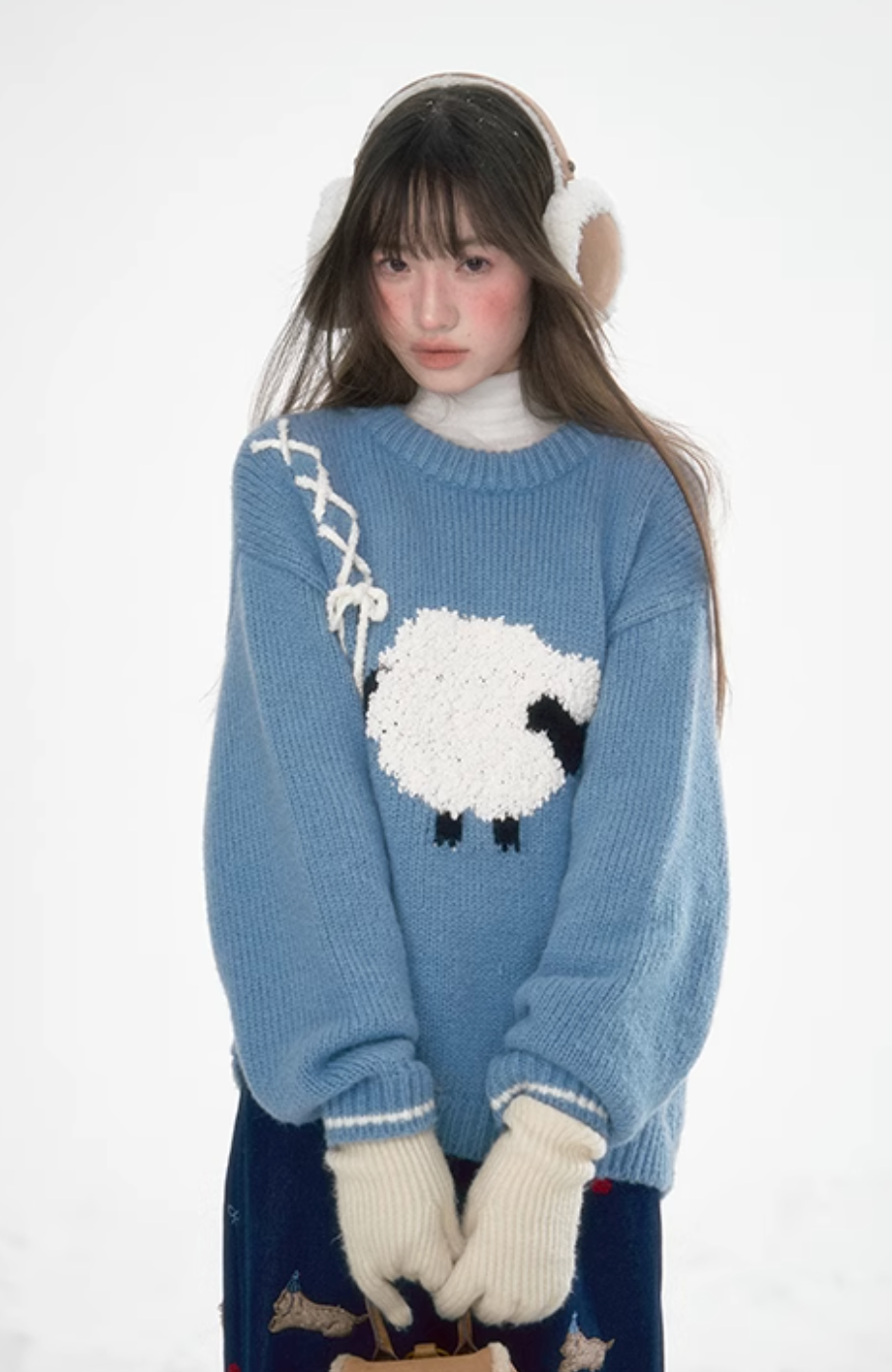 Blue lamb sweater with ribbon detail