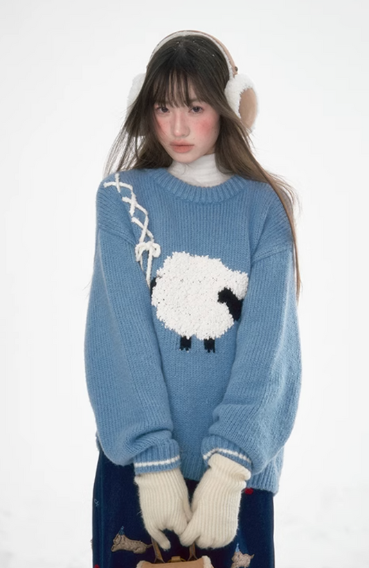 Blue lamb sweater with ribbon detail