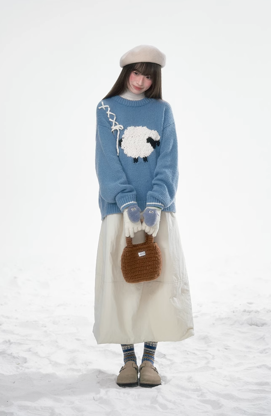 Blue lamb sweater with ribbon detail